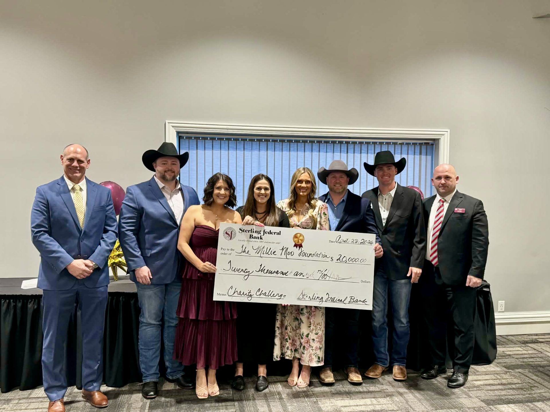 Dean Ahlers (SFB Board member), Garett Cary, Laura Cary, Erin Welker, Gabriella DeClercq, Wesley DeClercq, Hunter Littrel, and Bo Mays (SFB President/CEO) at the Charity Challenge presentation.