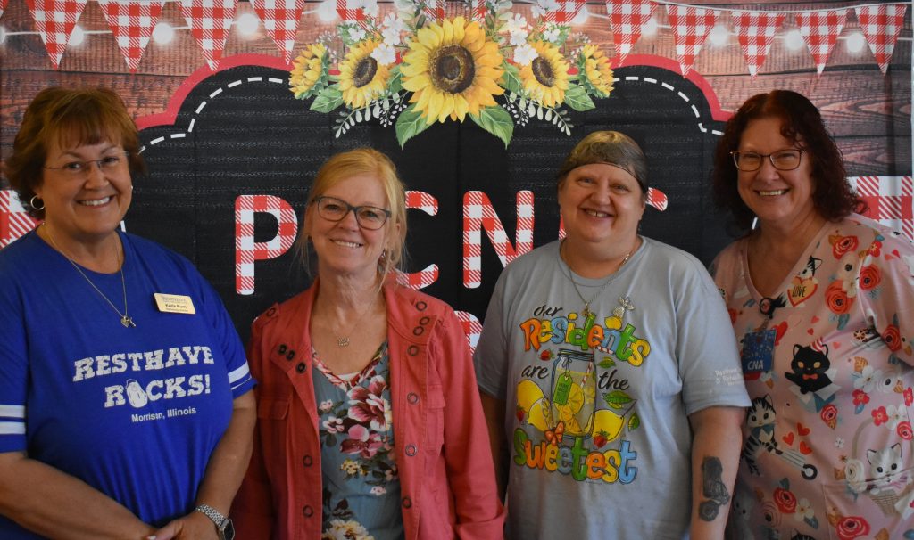Employees Karla Burn, Tawnya Denning, Tami Bull and Tammy Cady (L-R) were celebrated for 20 years at Resthave Home in Morrison.