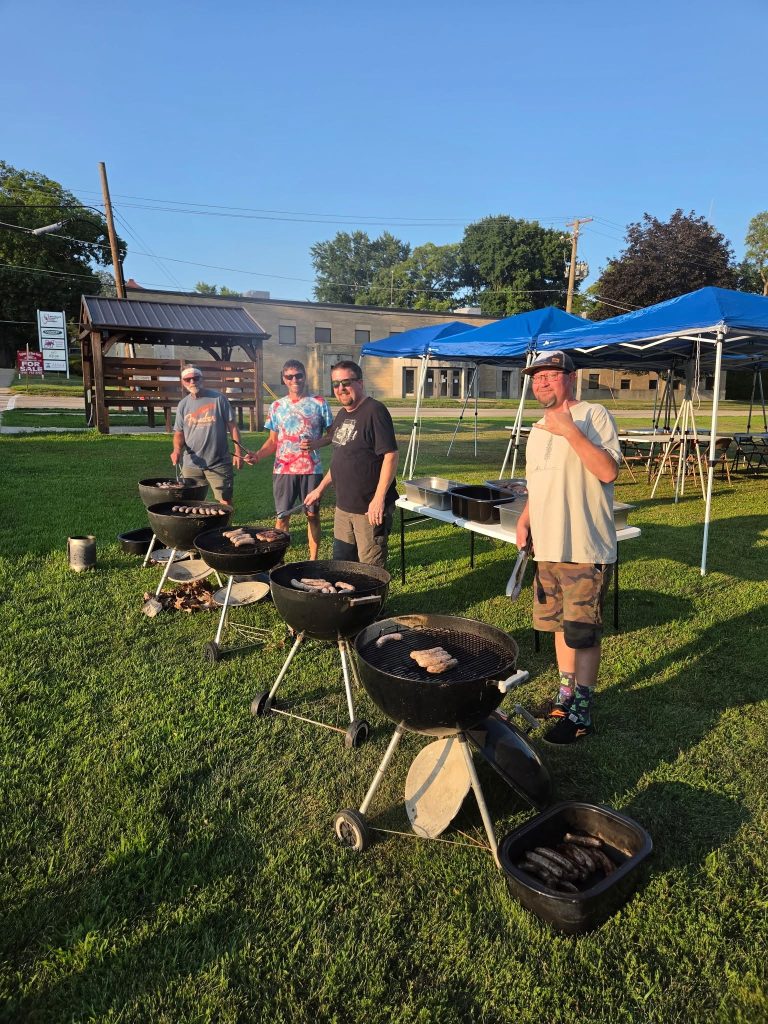 Grilling brats on Thursday at the First Presbyterian Church of Morrison!