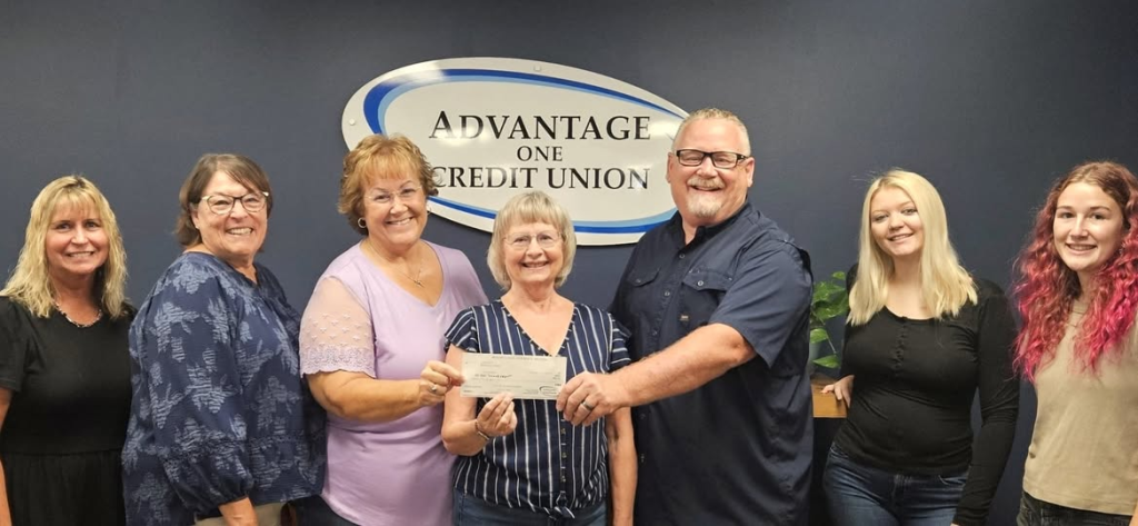 Pictured from left to right Kari Forster, from Advantage One, Charla Olson and Karla Burn from OTM, Janet Fisher, Michael Buckwalter, Chloe Prater and Geneva Connelly from Advantage One.