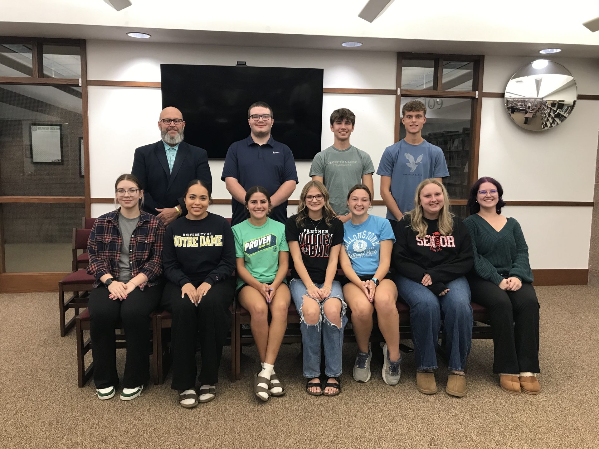 Recognized at Monday night's school board meeting were: Mara Ary, Novanna Lopez, Isabella Olvera, Lexi Kapple, Taylor Robshaw, Elley Weidel, and Sarah Carlson (front, L-R), and Mr. McConnell, Brice Howell, Elijah Foster, and Nathan Punke.