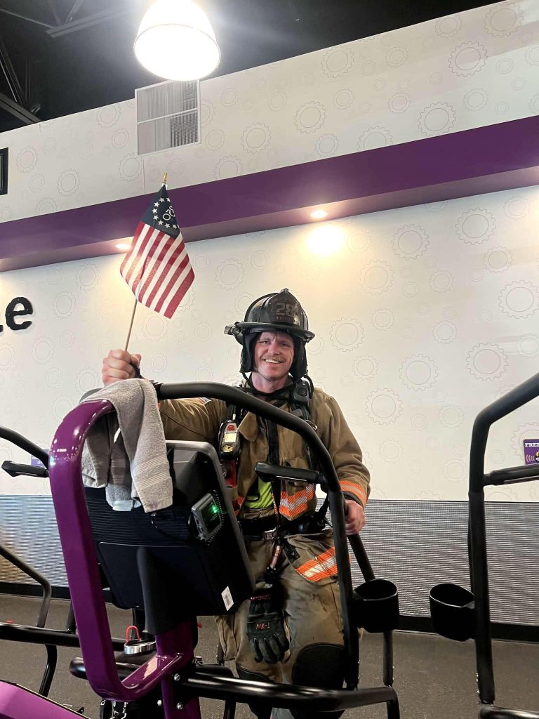 Erie firefighter Jodie Wells at the 2,200 Stair Climb at Planet Fitness on Friday, September 11th.