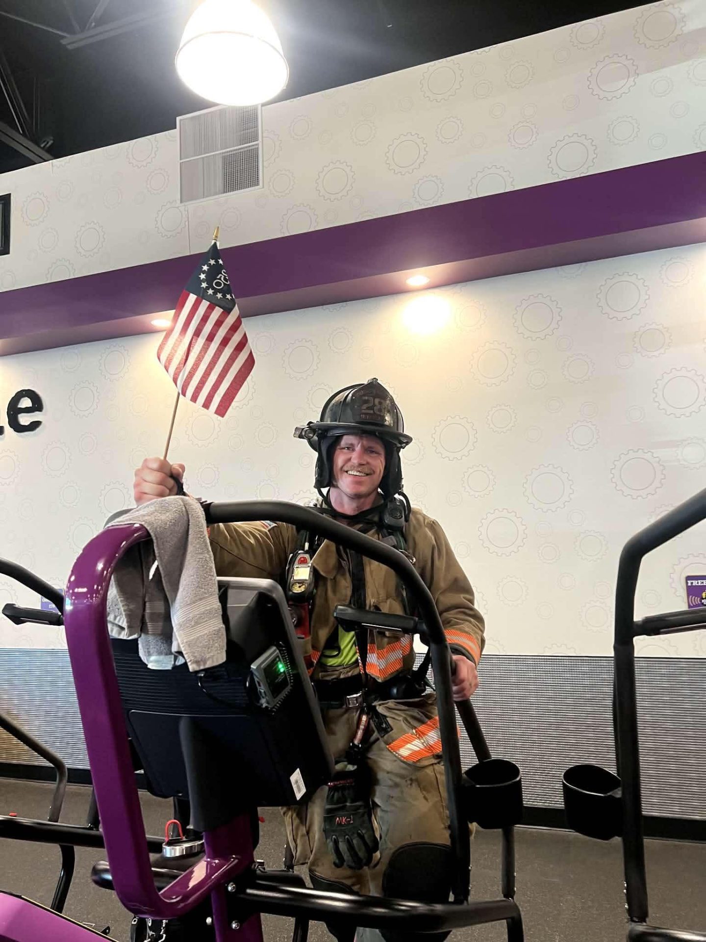 Erie firefighter Jodie Wells at the 2,200 Stair Climb at Planet Fitness on Friday, September 11th.