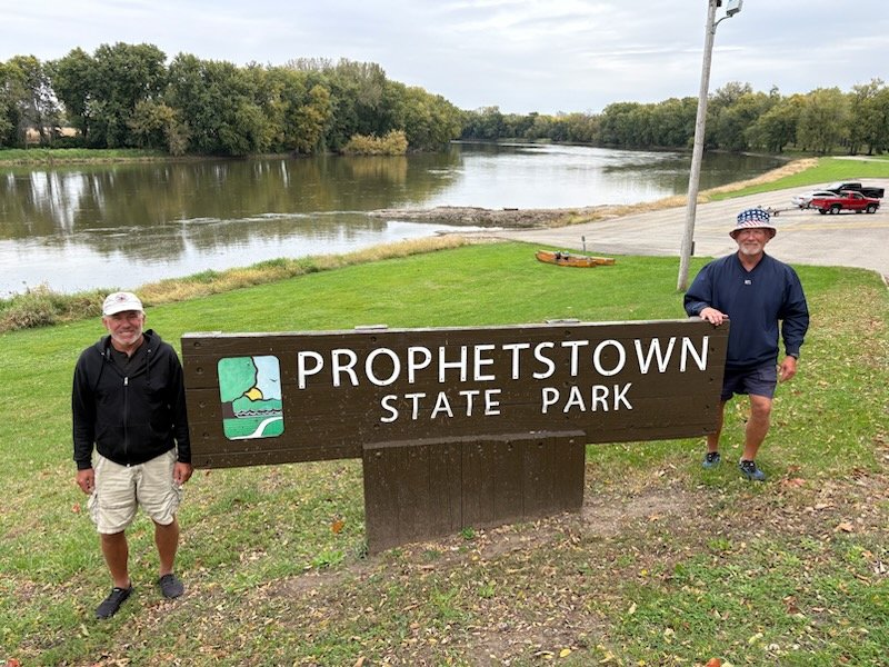 Gary Clark, left, and Eddie Hughes II made a stop in Prophetstown Wednesday as they paddle the entire length of the Rock River.