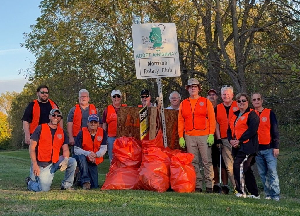 Morrison Rotary Club's highway clean-up crew, L-R: Dave Hegwood, Brad Yaklich, Rich Groleau, Go Pack Go John Prange!, Mike Gunderson, Kevin Schisler, Stan Steines, Karl Kovarik, Paul Van Kampen, Colleen Buckwalter, and JD Benko.